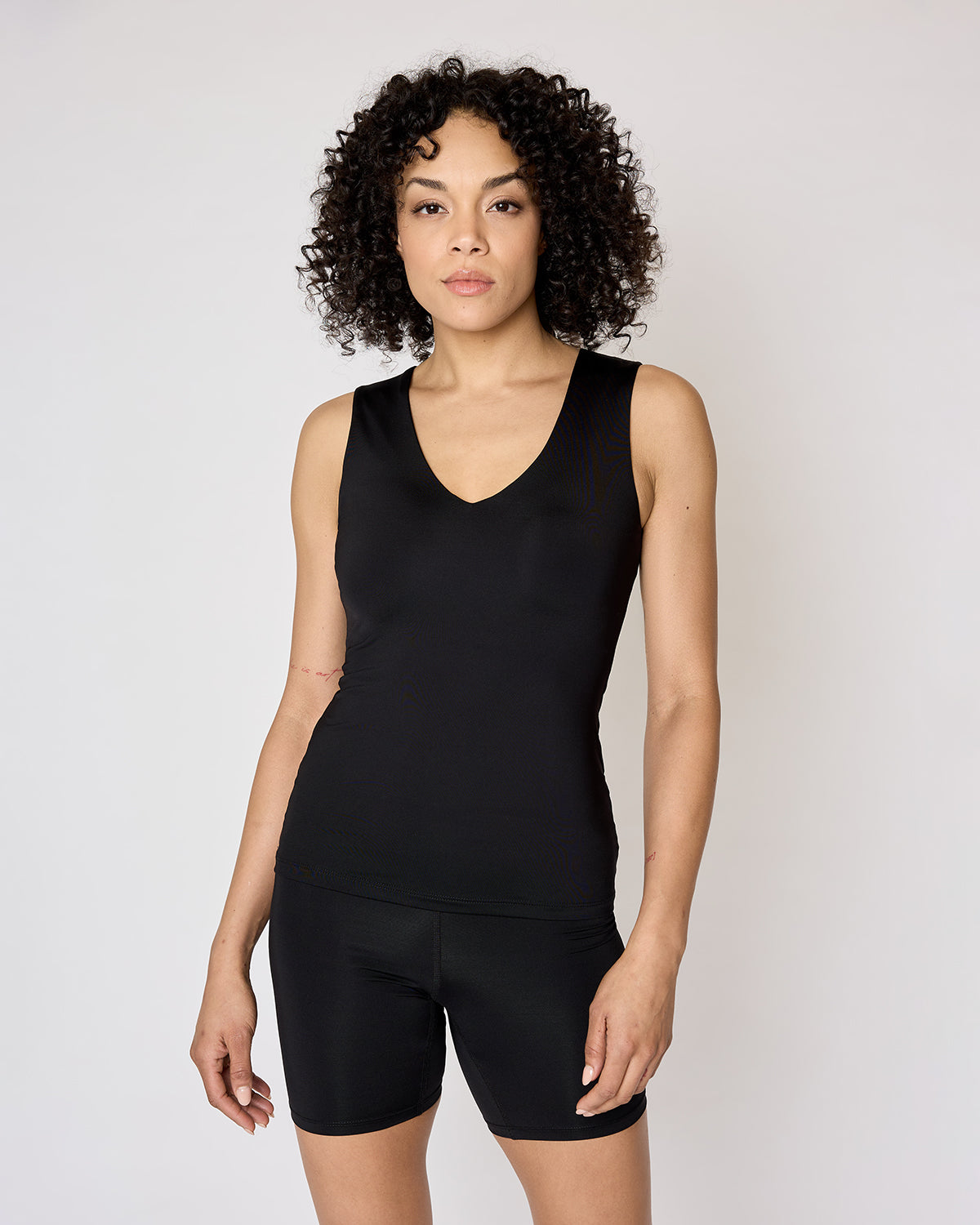 "#color_Black|Azi is 5'9" and wears a size S